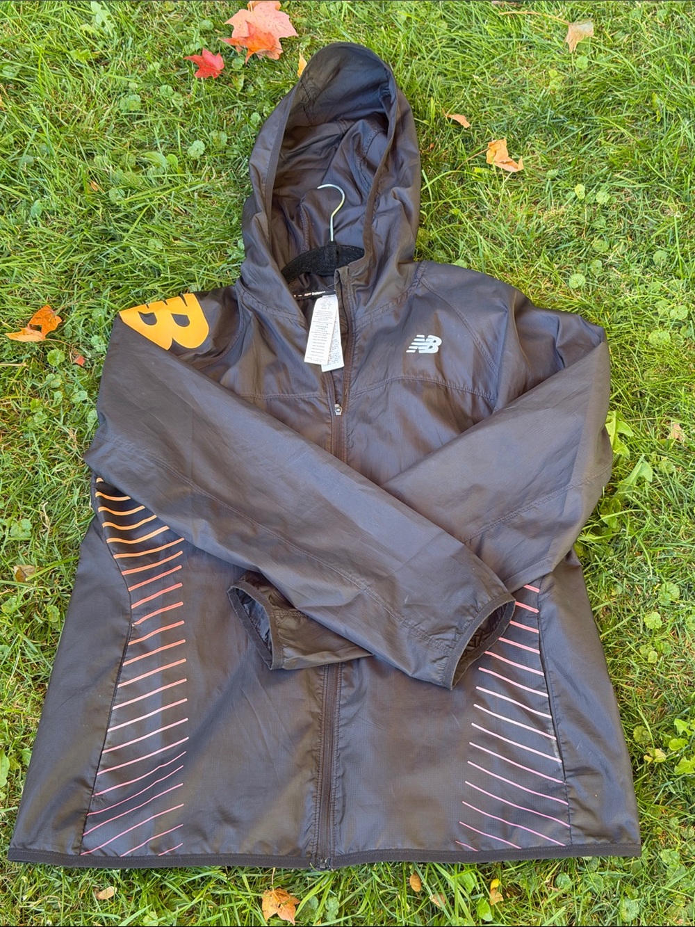New Balance Black Hooded Women’s Windbreaker with Orange and Pink Accents Size L